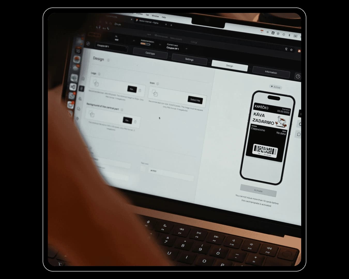 Man looking into a computer screen with CRM software open